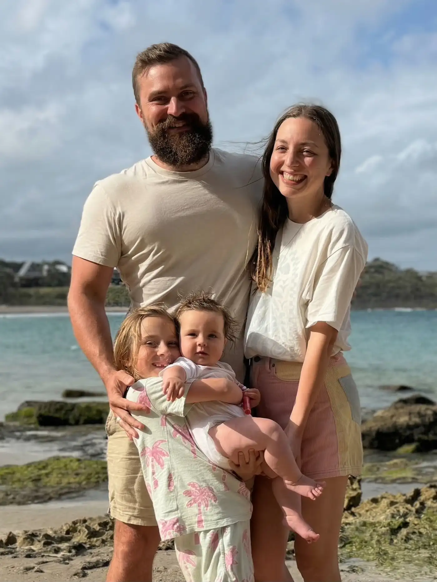 Ryan Furtner with his family at the beach